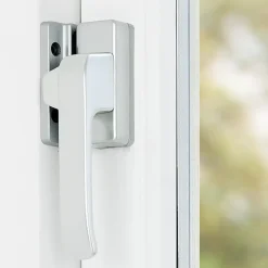 Raambeslag|Raamsluiting > AXA Raamsluiting design met nok rechts aluminium
