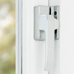 Raambeslag|Raamsluiting > AXA Raamsluiting design met nok links aluminium