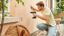 Accuboormachines|Boormachines > Bosch 18V klopboor EasyImpact incl. 1.5Ah accu+lader en 241-delige accessoireset in luxe koffer