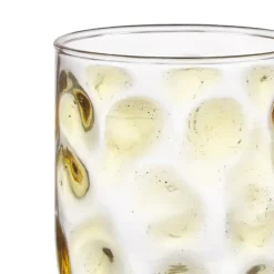 Glas met gele stippen